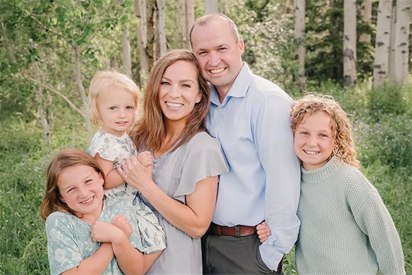 Oral Surgeon Moses Lake WA Tyler McDonald With Family Dr. Tyler McDonald and his family posing for a professional photo