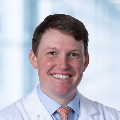 A headshot photo of Dr. Brian Christensen, an oral surgeon